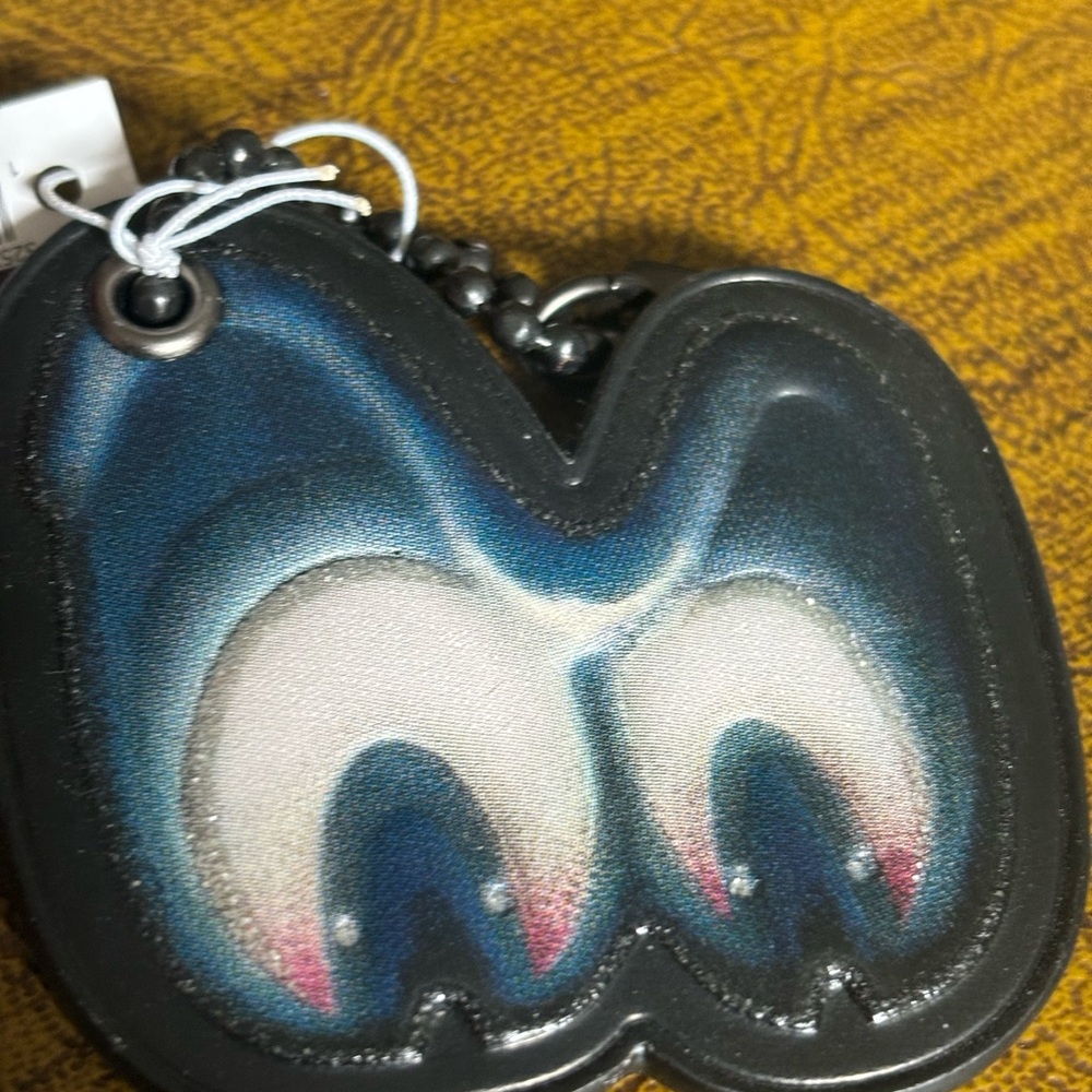 DISNEY x COACH Snow White Spooky Eyes Hangtag Chrm